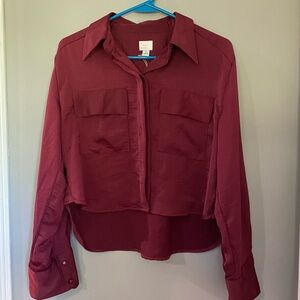 Maroon colored blouse.